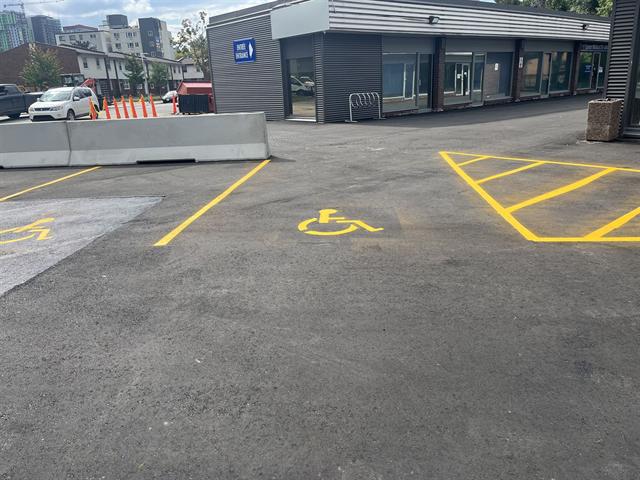 Freshly painted parking stall markings in an Ottawa lot