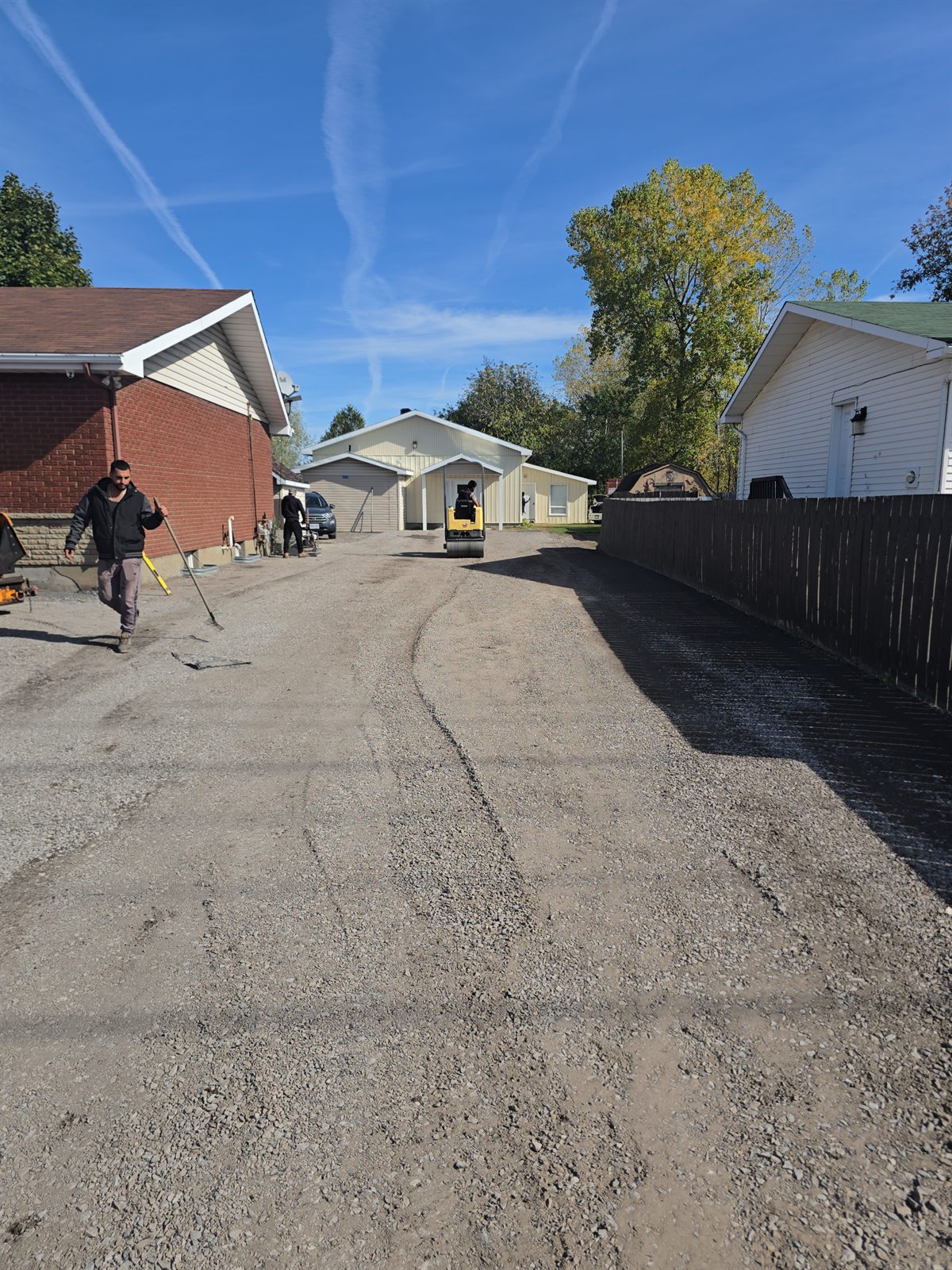 Freshly sealed interlock paver patio beside a home in Ottawa
