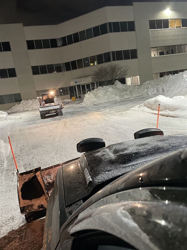 Overnight snow clearing at a commercial building in Ottawa